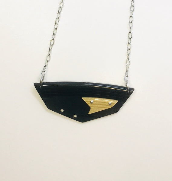 Black and gold riveted