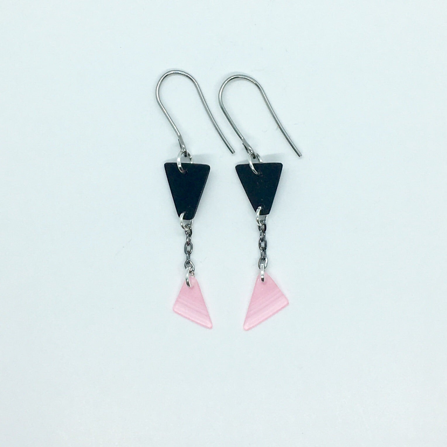 Black and pink dangling triangle earrings