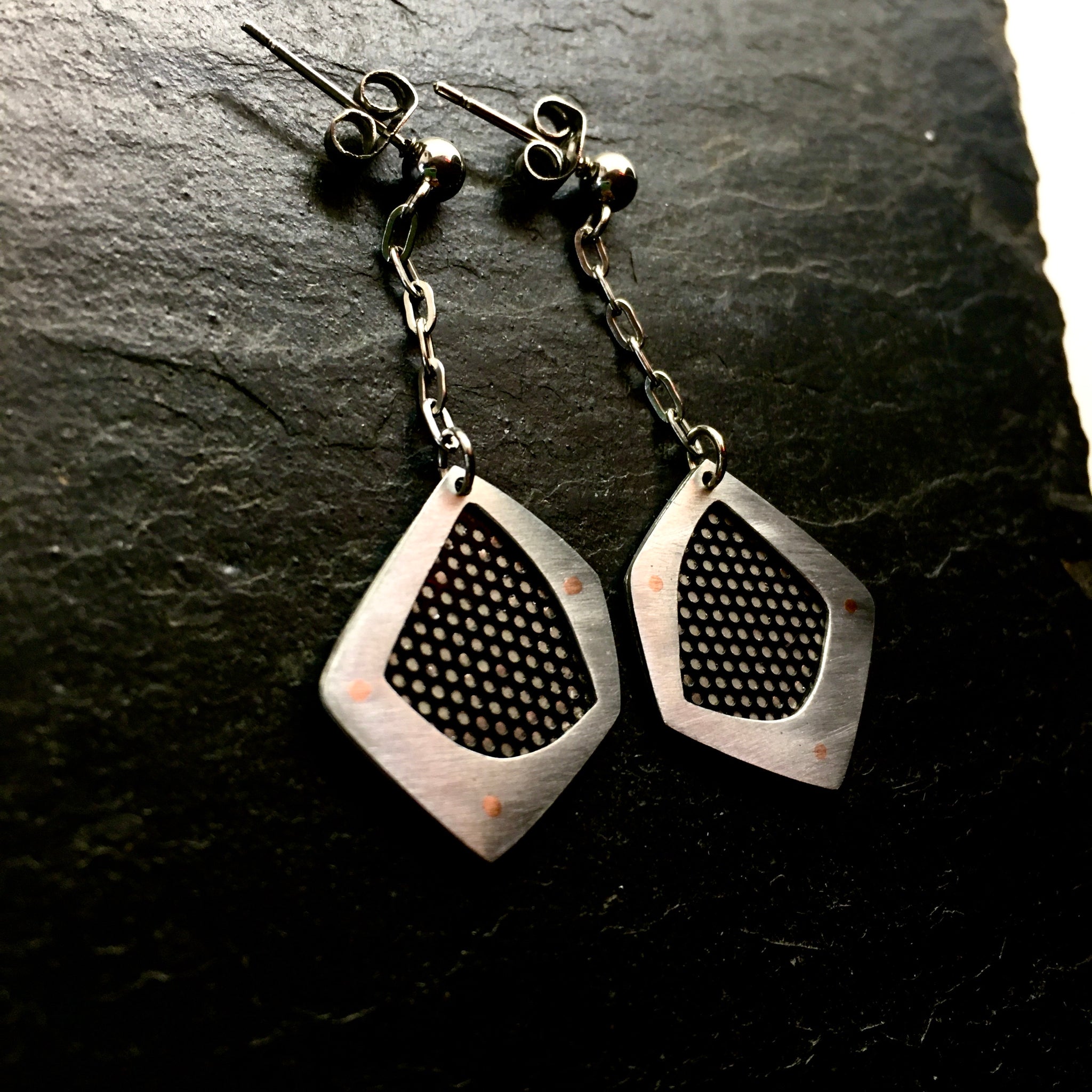 Steel fan casing earrings