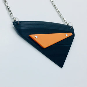 Black and orange riveted large necklace